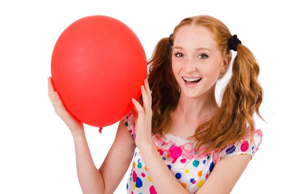 Mujer joven con globo rojo aislado en blanco — Foto de Stock