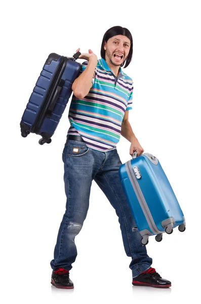 Young man travelling with suitcases isolated on white — Stock Photo, Image