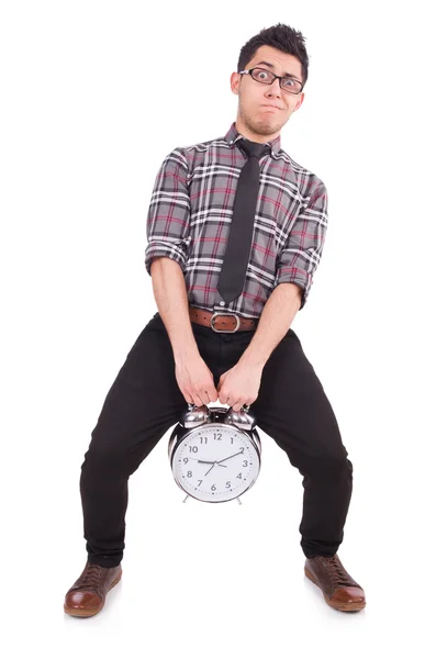 Чоловік з годинником намагається дотриматися терміну — стокове фото