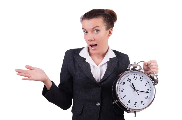 Businesswoman with clock missing her deadlines — Stock Photo, Image