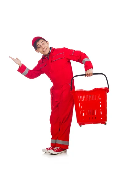 Man in red coveralls with shopping supermarket cart trolley — Stock Photo, Image