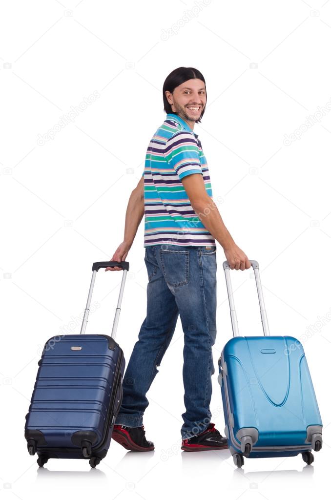 Young man travelling with suitcases isolated on white