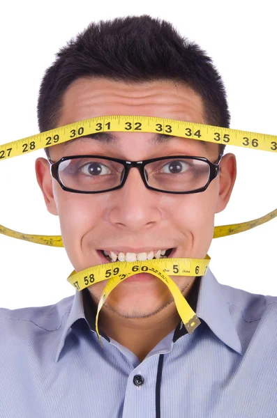 ダイエットの概念でセンチメートルを持つ男 — ストック写真