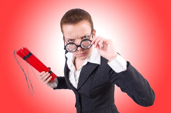 Businesswoman with dynamite — Stock Photo, Image