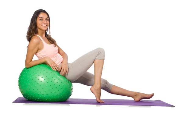 Young woman exercising with swiss ball — Stock Photo, Image