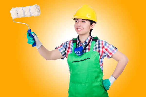 Woman painter with paintbrush on white — Stock Photo, Image