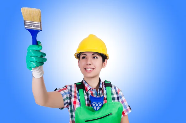 Woman painter with paintbrush on white — Stock Photo, Image