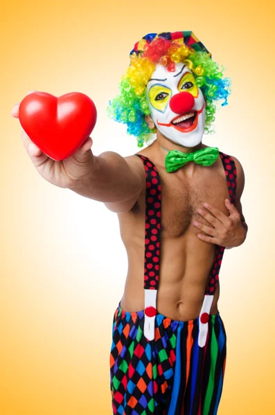 Clown with heart isolated on white — Stock Photo, Image