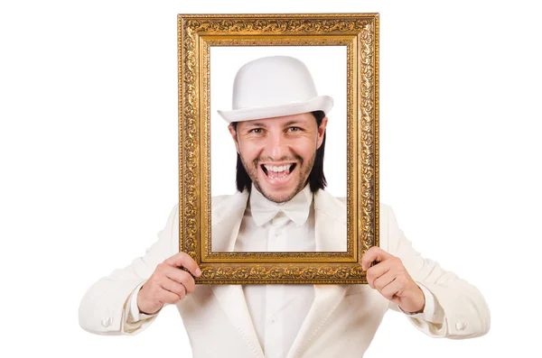 Hombre en traje blanco con marco de imagen — Foto de Stock