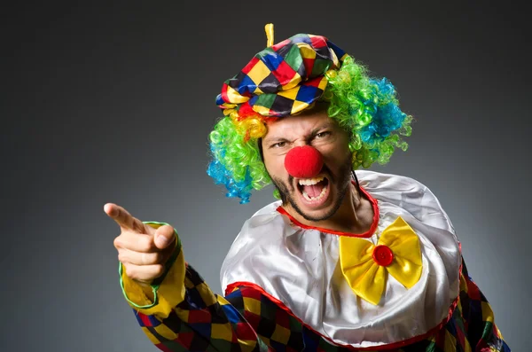 Funny clown in colourful costume — Stock Photo, Image