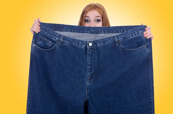 Dieting concept with oversize jeans — Stock Photo, Image