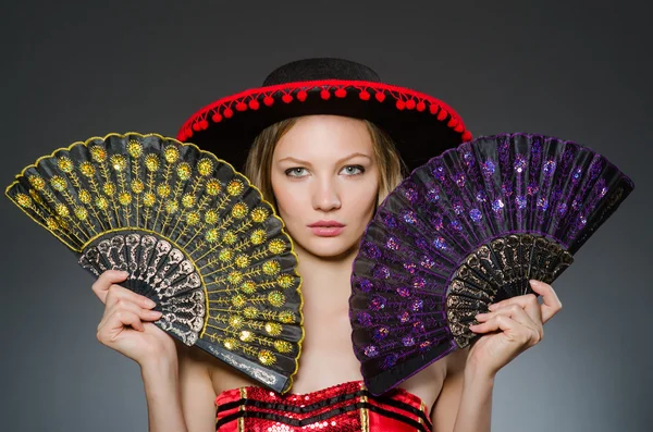 Woman dancing with fans — Stock Photo, Image