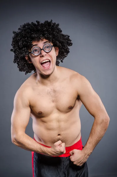 Funny sportsman sporting his muscles — Stock Photo, Image