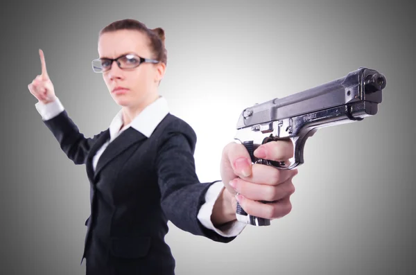 Woman with gun — Stock Photo, Image