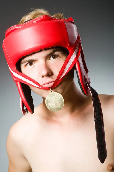 Funny boxer with winning gold medal — Stock Photo, Image