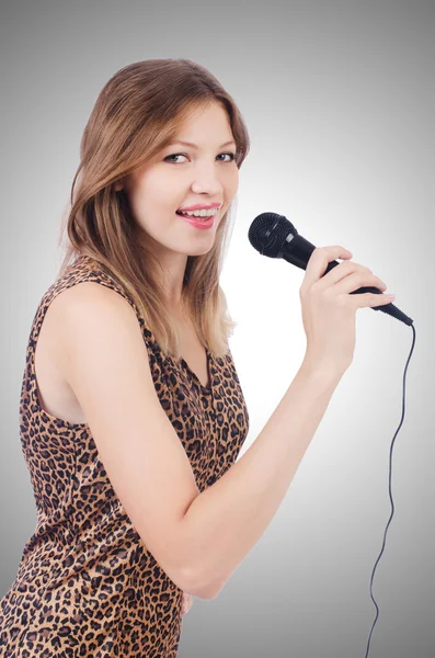 Woman singer with microphone — Stock Photo, Image