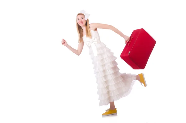 Woman in wedding dress with suitcase — Stock Photo, Image