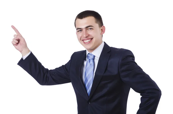 Молодой привлекательный бизнесмен указывает — стоковое фото