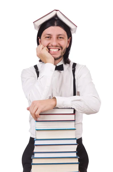 Studente divertente con libri isolati su bianco — Foto Stock