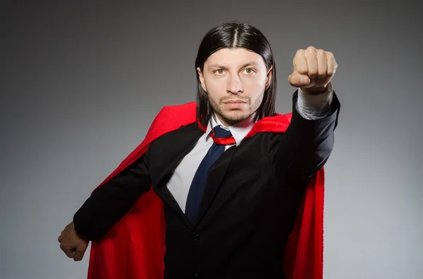 Superman concept with man in red cover — Stock Photo, Image