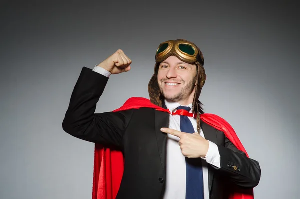 Superman concept with man in red cover — Stock Photo, Image