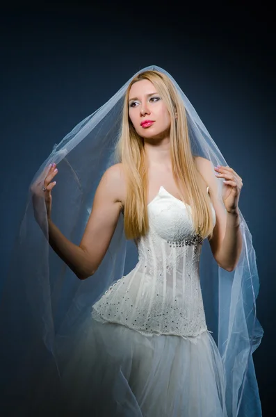 Bride in white dress in studio — Stock Photo, Image