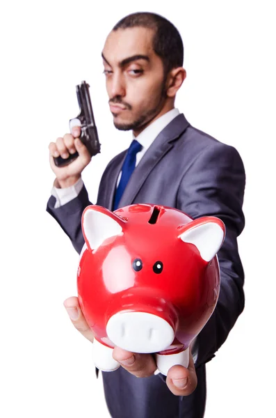 Businessman killing the piggy bank — Stock Photo, Image