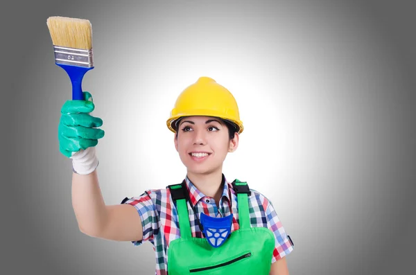 Woman painter with paintbrush — Stock Photo, Image