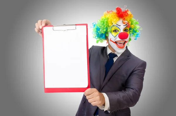 Businessman clown with card — Stock Photo, Image