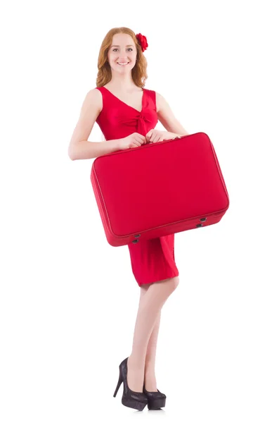 Woman in red dress and travel case — Stock Photo, Image