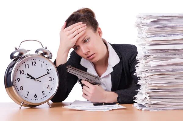 Woman with gun under stress from deadlines — Stock Photo, Image