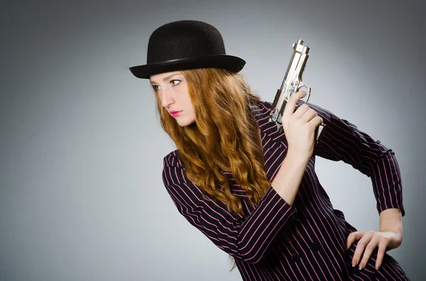 Woman gangster with gun in vintage concept — Stock Photo, Image