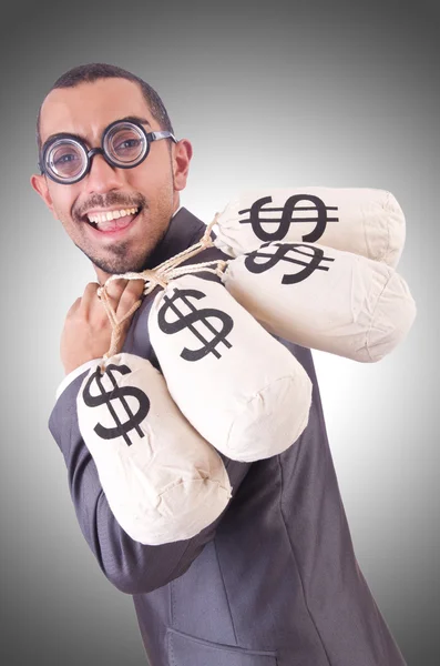 Hombre con sacos de dinero —  Fotos de Stock