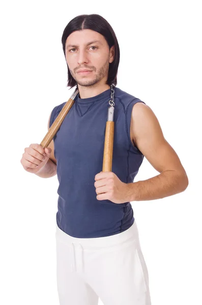 Divertido luchador de karate con nunchucks en blanco —  Fotos de Stock