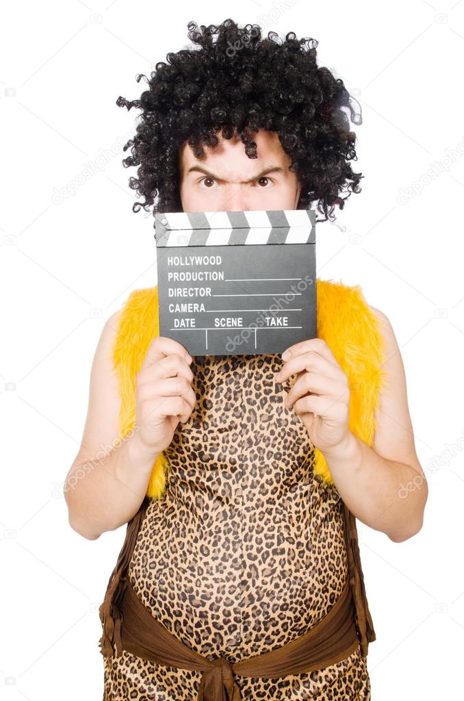 Cave man with movie board isolated on white