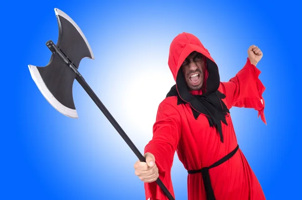 Executioner in red costume with axe — Stock Photo, Image