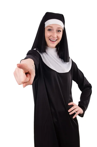 Junge lächelnde Nonne zeigt vereinzelt auf Weiß — Stockfoto