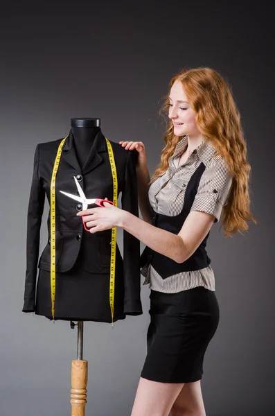 Woman tailor working on new dress — Stock Photo, Image