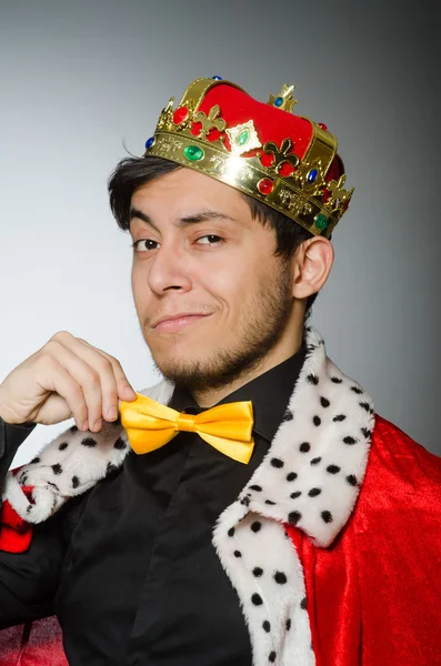 Concept with funny man wearing crown — Stock Photo, Image