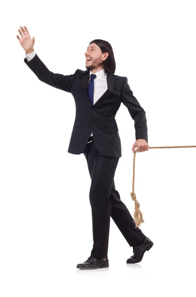 Jonge zakenman trekt touw geïsoleerd op wit — Stockfoto