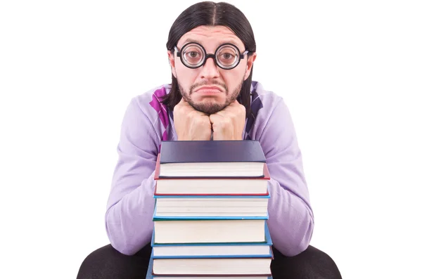 Studente divertente con libri isolati su bianco — Foto Stock