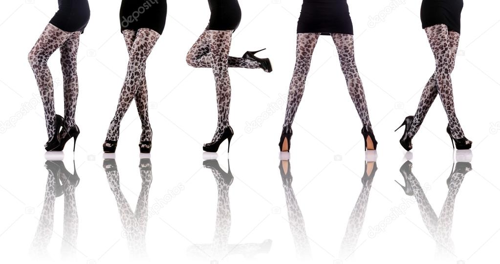 Woman legs isolated on the white background