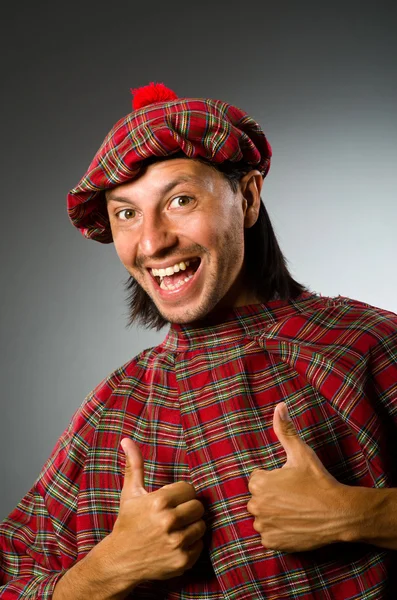 Funny scotsman in traditional clothing — Stock Photo, Image