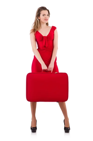 Woman in red dress and travel case — Stock Photo, Image