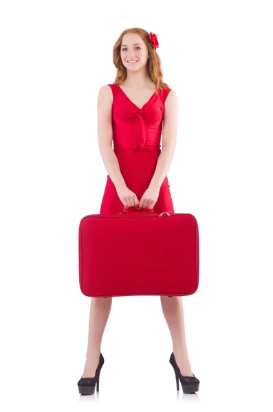 Woman in red dress and travel case — Stock Photo, Image