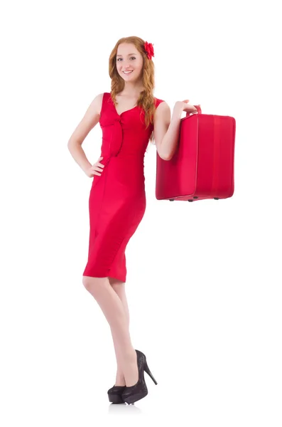 Mulher em vestido vermelho e caixa de viagem — Fotografia de Stock