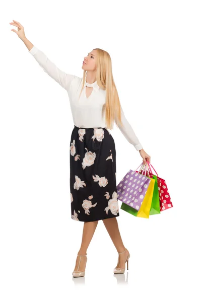Alışveriş torbaları olan kadın beyazda yalnız. — Stok fotoğraf