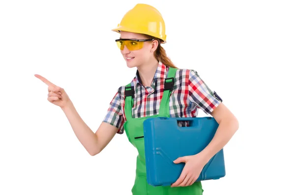 Construtor fêmea com caixa de ferramentas apontando isolado no branco — Fotografia de Stock