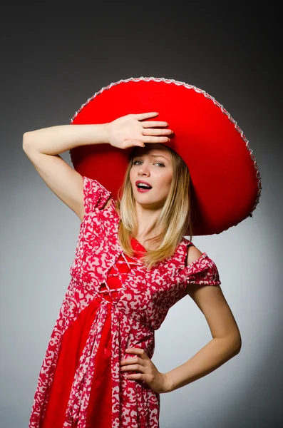 Woman wearing sombrero hat in funny concept — Stock Photo, Image