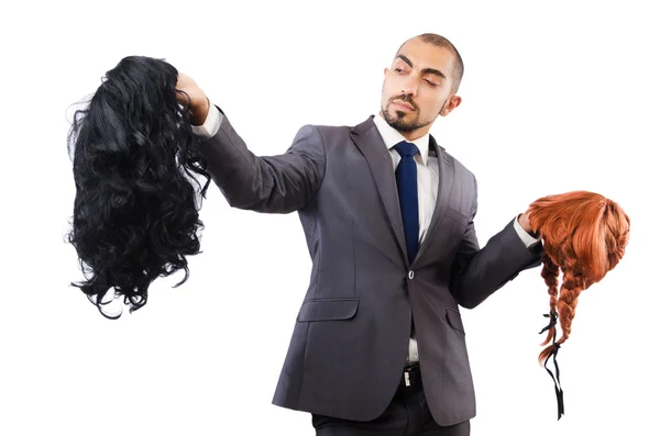 Бізнесмен з жіночими перуками — стокове фото